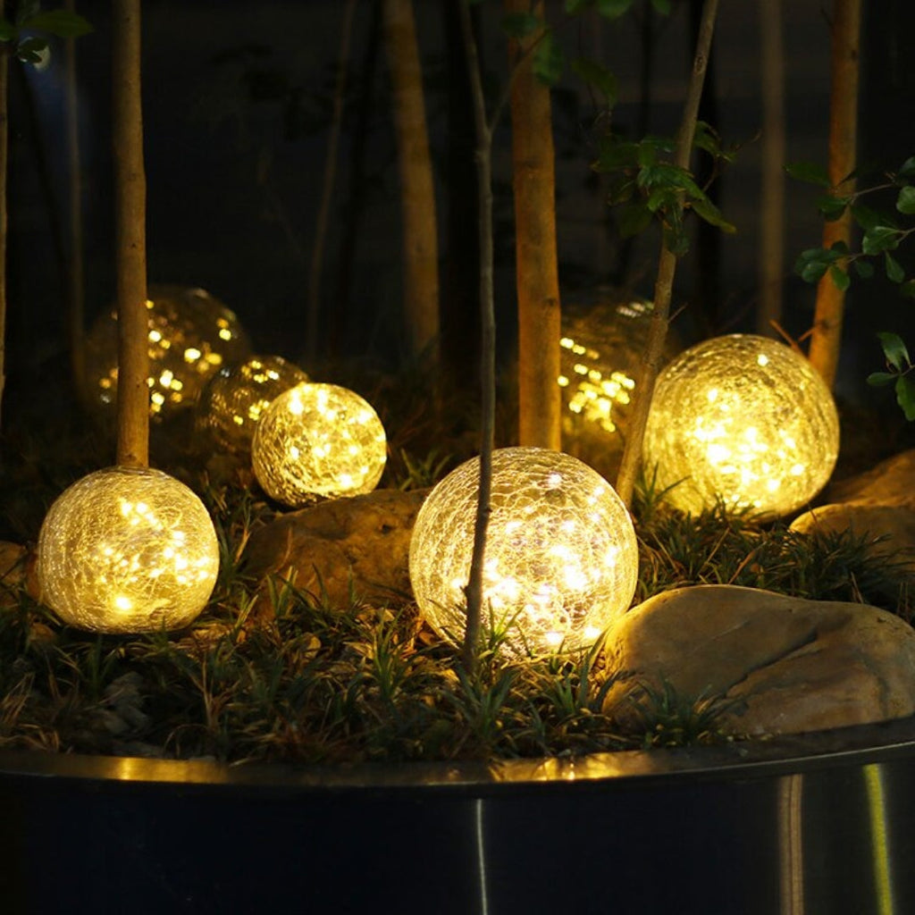 GlowGlobe - Solar knitrende glaslys med jordstag
