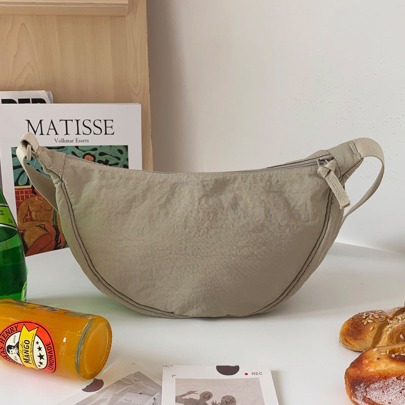 CurveCross - Stilfuld buet crossbody-taske til mode på farten