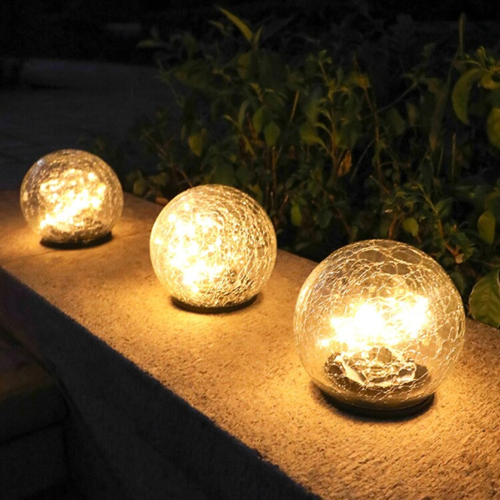 GlowGlobe - Solar knitrende glaslys med jordstag