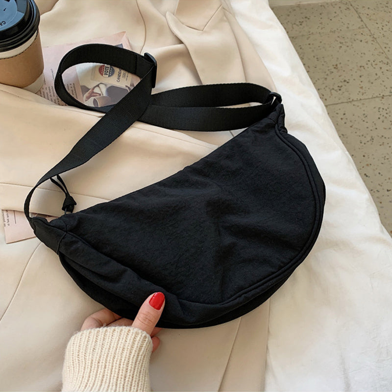 CurveCross - Stilfuld buet crossbody-taske til mode på farten