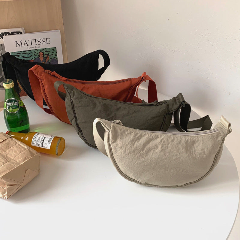 CurveCross - Stilfuld buet crossbody-taske til mode på farten