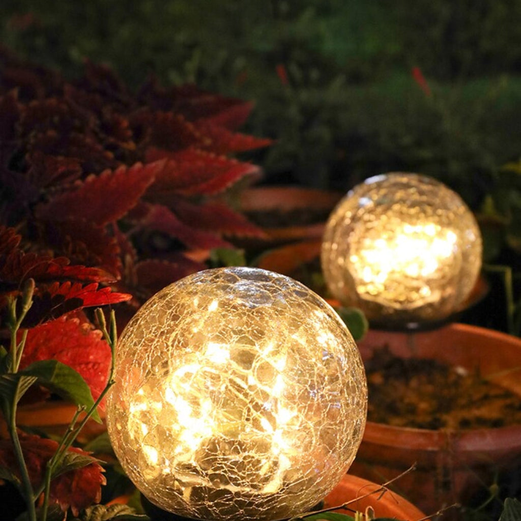 GlowGlobe - Solar knitrende glaslys med jordstag