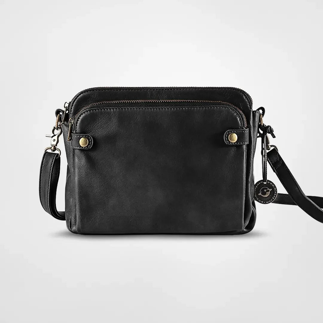 Flora - Clutch og skuldertaske i imiteret læder