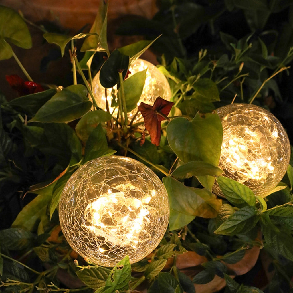 GlowGlobe - Solar knitrende glaslys med jordstag
