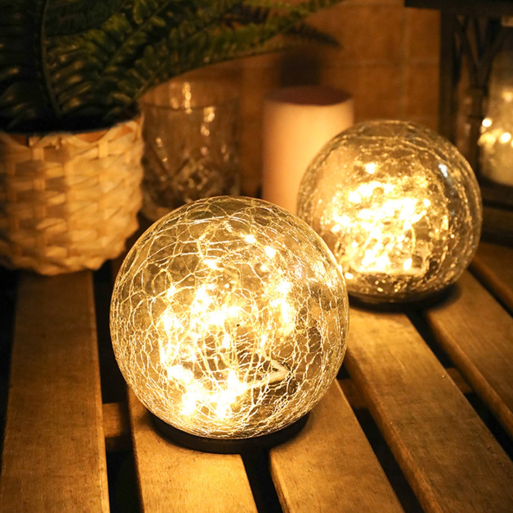 GlowGlobe - Solar knitrende glaslys med jordstag