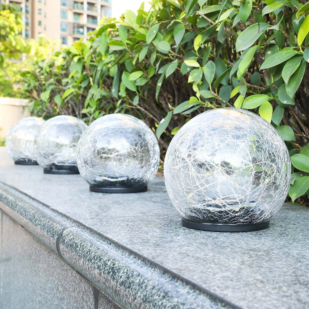GlowGlobe - Solar knitrende glaslys med jordstag
