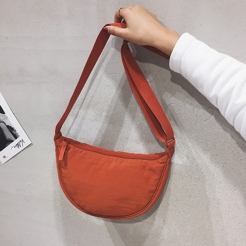 CurveCross - Stilfuld buet crossbody-taske til mode på farten