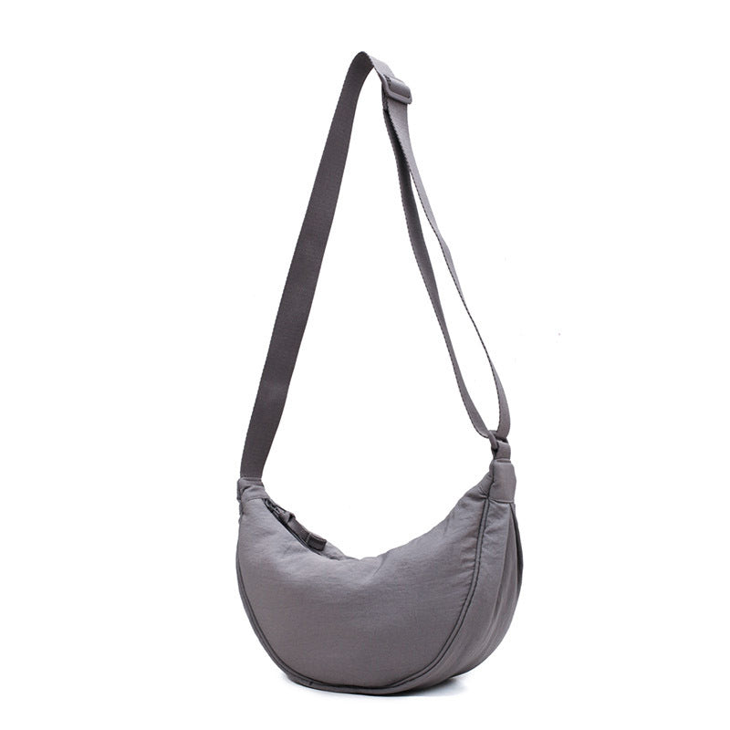 CurveCross - Stilfuld buet crossbody-taske til mode på farten