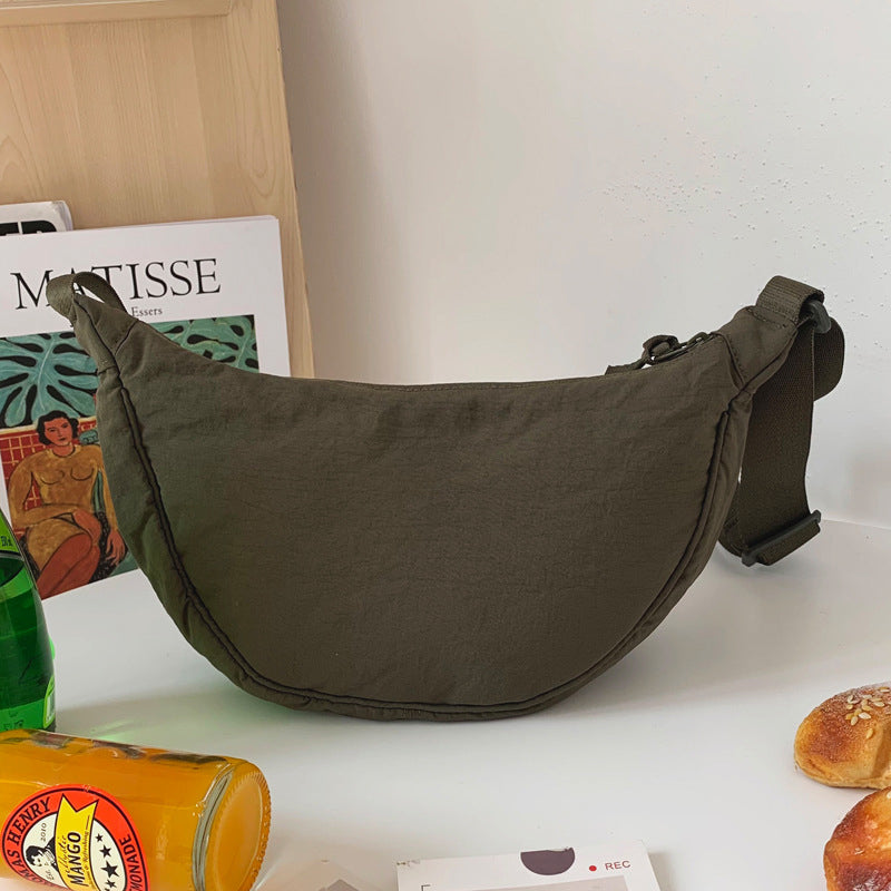 CurveCross - Stilfuld buet crossbody-taske til mode på farten