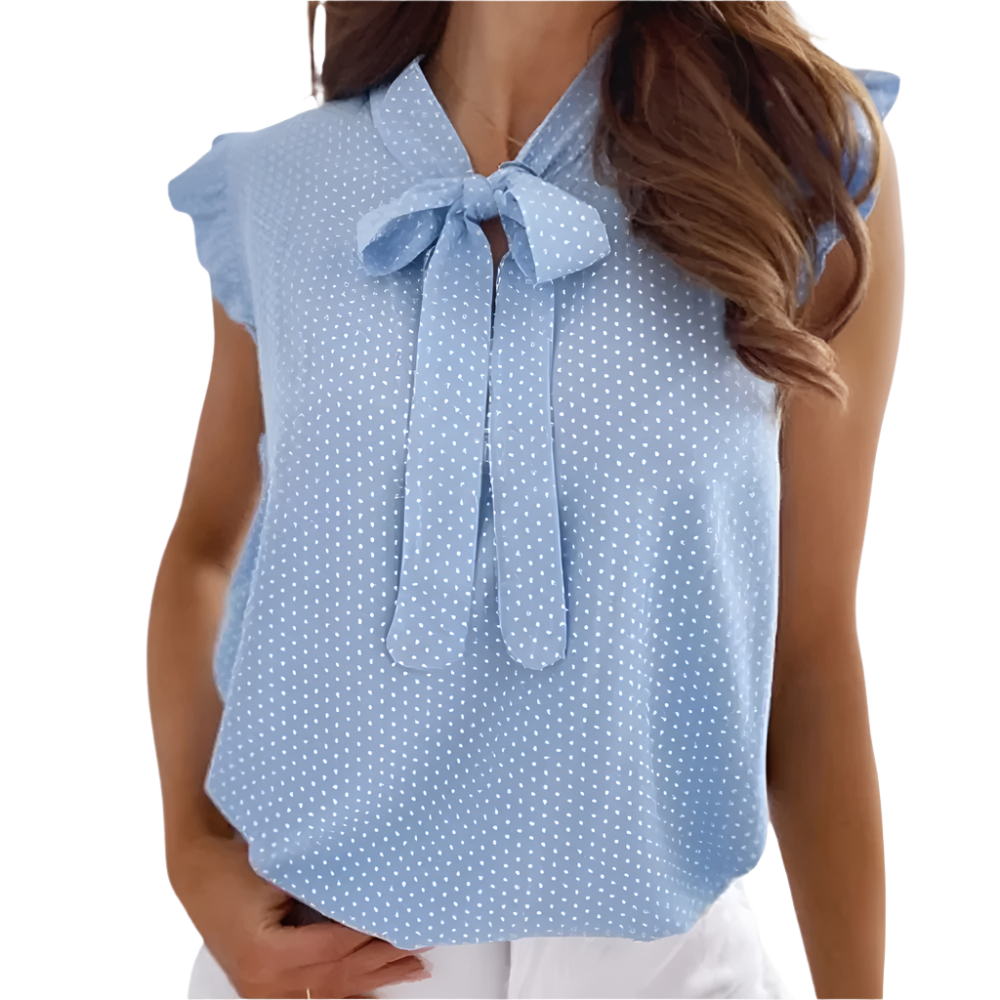 Kira - Prikket bluse med flæseudskæring og butterfly-detalje