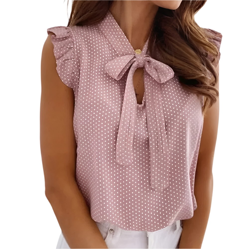 Kira - Prikket bluse med flæseudskæring og butterfly-detalje