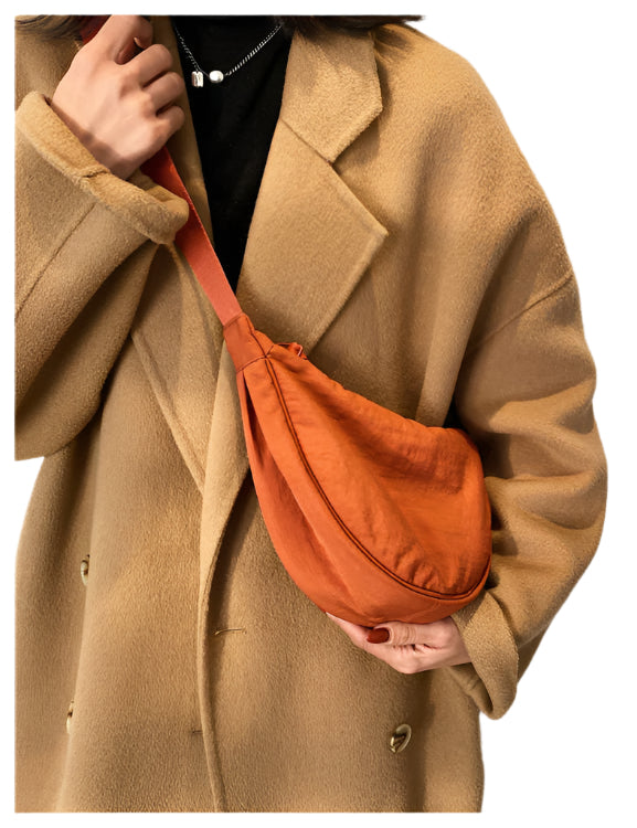 CurveCross - Stilfuld buet crossbody-taske til mode på farten