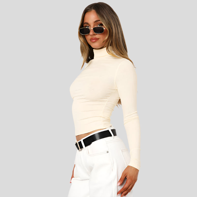 Slim fit rullekravetop med flæsedetaljer – Elegant stretchbomuldsbluse til kvinder