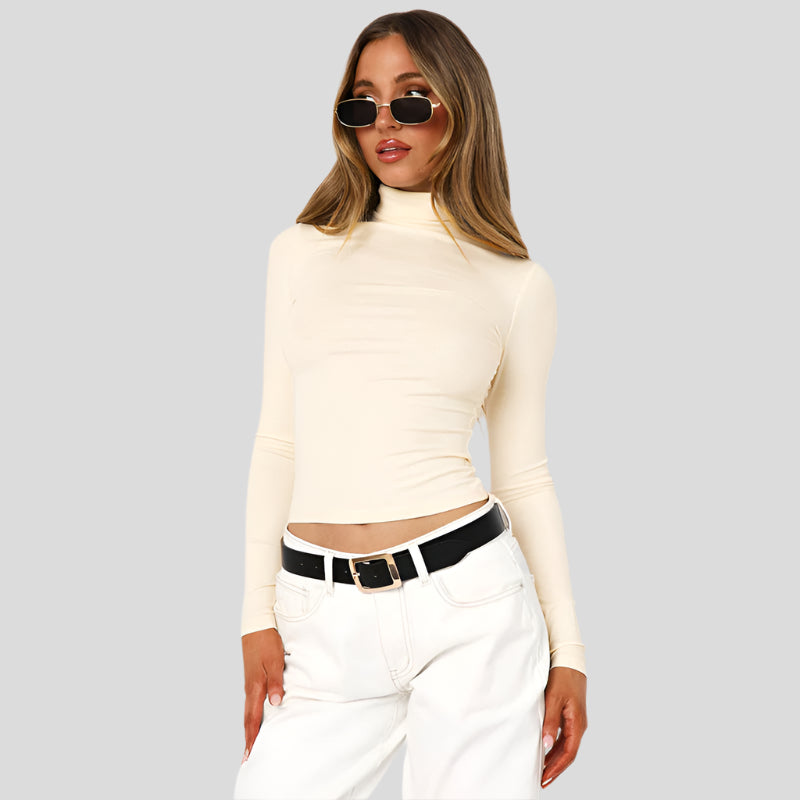 Slim fit rullekravetop med flæsedetaljer – Elegant stretchbomuldsbluse til kvinder