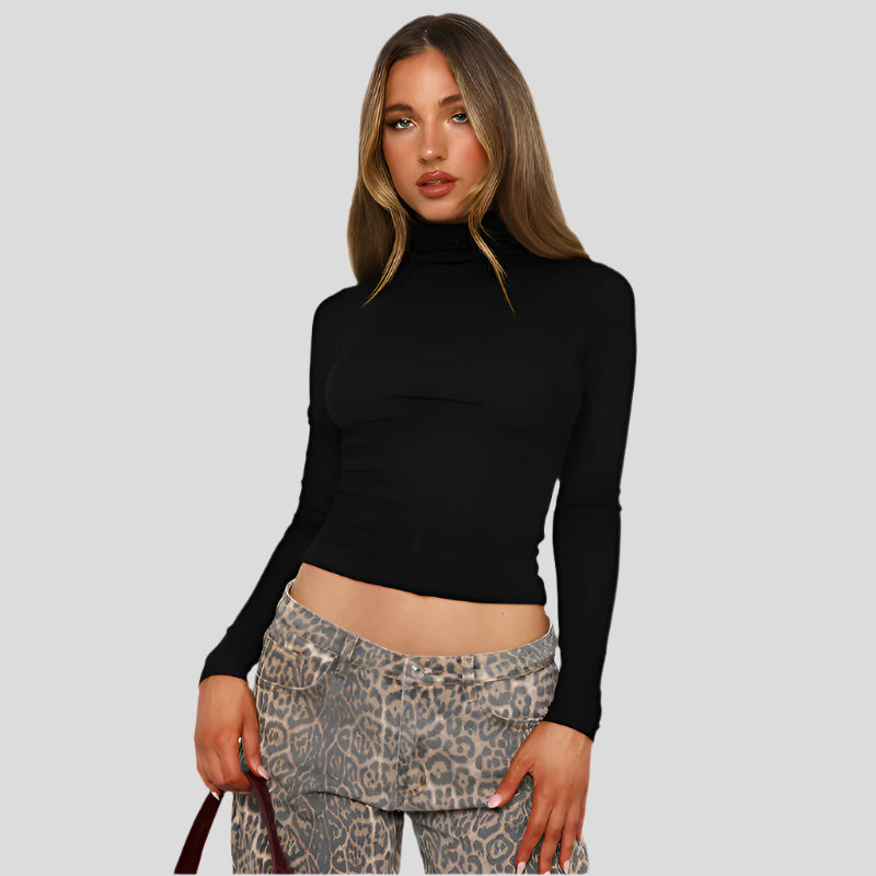 Slim fit rullekravetop med flæsedetaljer – Elegant stretchbomuldsbluse til kvinder