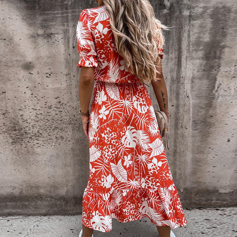 Belinda- Elegant blomstret midikjole med V-hals charme